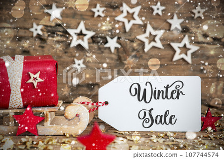 Sled With Gift, Christmas Snowy Background With Text Winter Sale Sled With Gift, Christmas Snowy Background With Text Winter Sale 107744574