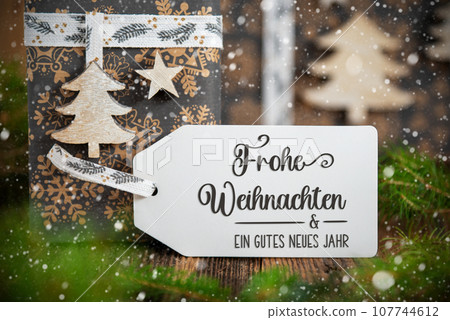 Text Frohe Weihnachten, Means Merry Christmas, Christmas Gifts,Snowy Winter Deco Text Frohe Weihnachten, Means Merry Christmas, Christmas Gifts,Snowy Winter Deco 107744612