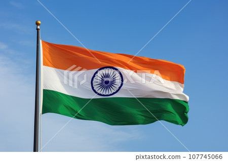 Indian flag waving on blue sky background 107745066