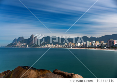 Long Exposure of Ipanema's Coastline with Serene Sea from Arpoador Stone 107748110