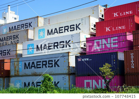 Sea containers piled up in a vanpool at Oi Wharf (wide) Sea containers piled up in a vanpool at Oi Wharf (wide) 107748415