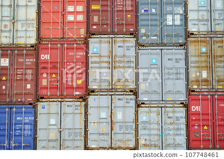 A colorful patchwork of maritime containers 107748461