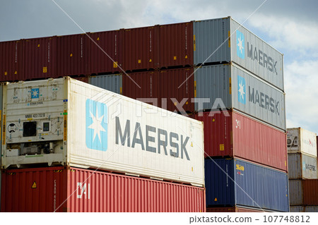 Sea containers piled up in a vanpool (MAERSK) Sea containers piled up in a vanpool (MAERSK) 107748812