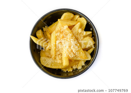 Top view Potato fries on black plate isolated on white background. 107749769
