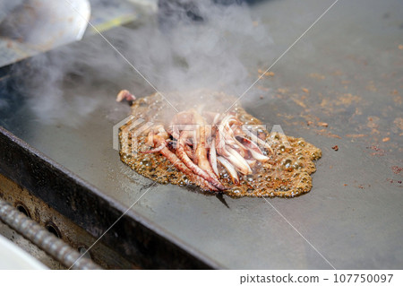 squid on a griddle squid on a griddle 107750097