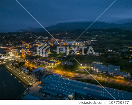 Aerial night view of Killybegs, the most important fishing harbour town in Ireland, County Donegal 107750877