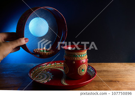 Happy karwa chauth celebration. Karwa Chauth celebration on the night Happy karwa chauth celebration. Karwa Chauth celebration on the night 107750896