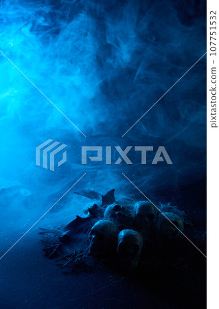 Halloween human skulls in abstract smoke on black background. 107751532