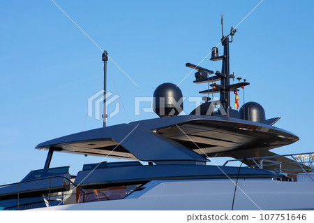 Navigation system on a yacht against a blue sky. Navigation system on a yacht against a blue sky. 107751646
