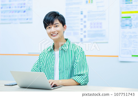 college student using computer 107751743