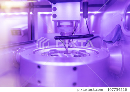 Cad cam milling machine in dental laboratory. Production of high esthetic dental crowns and dentures. Cad cam milling machine in dental laboratory. Production of high esthetic dental crowns and dentures. 107754216