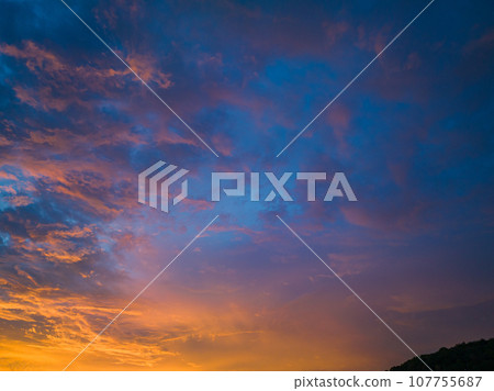 .amazing colorful orange cloud above the ocean in sunset 107755687
