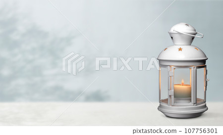 table with candle lantern 107756301