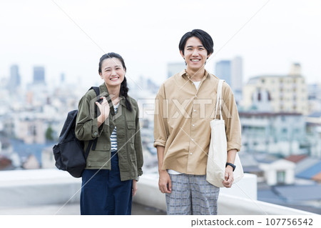 Young men and women college students 107756542