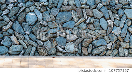 Stone wall construction at a tourist spot 107757367