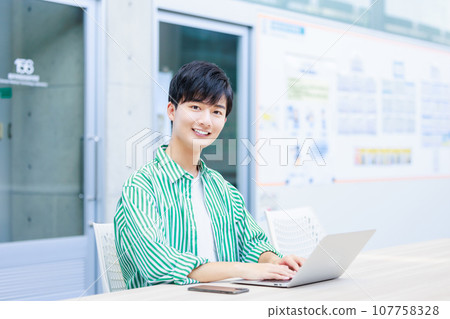 college student using computer 107758328