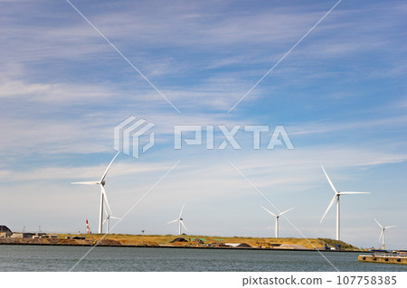 Wind turbines standing on the sea Wind turbines standing on the sea 107758385