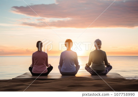 Senior woman practicing yoga and meditation on the beach .Generative AI 107758990