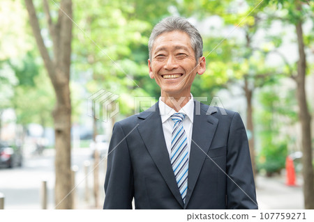 Walking senior man business Walking senior man business 107759271