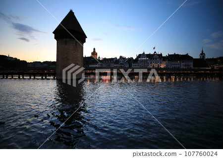 Evening view of the Chapel Bridge in Lucerne Evening view of the Chapel Bridge in Lucerne 107760024