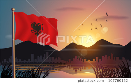 Albania flags flutter against the sunrise sky and beautiful lake. Celebrating national day and travel tourism Albania flags flutter against the sunrise sky and beautiful lake. Celebrating national day and travel tourism 107760132