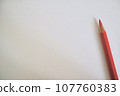 Red watercolor pencil and white background 107760383