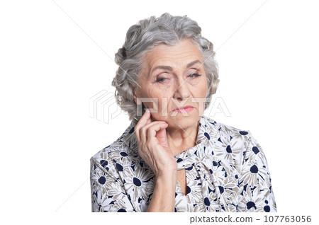 sad senior woman isolated on white background sad senior woman isolated on white background 107763056