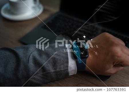 man check health with hand on smart watch touch data on health care show health program heartbeat body health analysis exercise rate man check health with hand on smart watch touch data on health care show health program heartbeat body health analysis exercise rate 107763391
