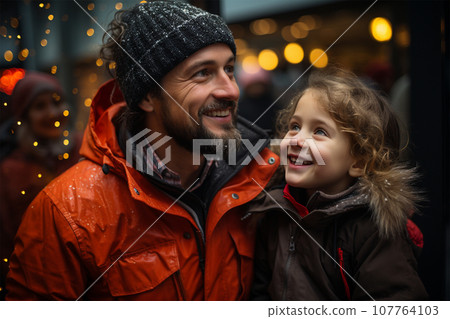 happy dad and daughter, family having fun at the Christmas market happy dad and daughter, family having fun at the Christmas market 107764103