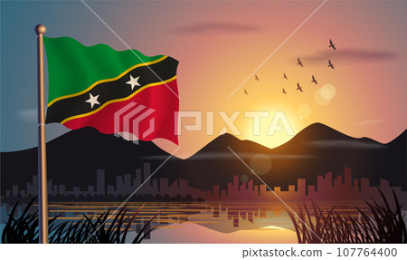 ST. Kitts Nevis flags flutter against the sunrise sky and beautiful lake. Celebrating national day and travel tourism ST. Kitts Nevis flags flutter against the sunrise sky and beautiful lake. Celebrating national day and travel tourism 107764400