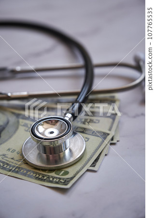 a medical stethoscope light background a medical stethoscope light background 107765535