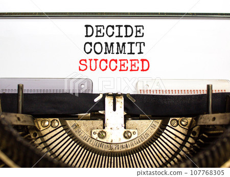 Decide commit succeed symbol. Concept word Decide Commit Succeed typed on beautiful retro old typewriter. Beautiful white paper background. Business decide commit succeed concept. Copy space. Decide commit succeed symbol. Concept word Decide Commit Succeed typed on beautiful retro old typewriter. Beautiful white paper background. Business decide commit succeed concept. Copy space. 107768305