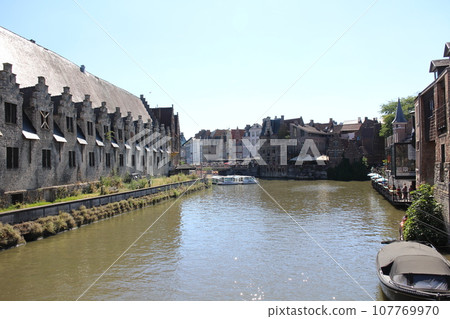 Belgium, Ghent, Leie river and old town skyline Belgium, Ghent, Leie river and old town skyline 107769970