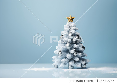 Festive white Christmas tree with decoration balls and gold star blue silver banner Festive white Christmas tree with decoration balls and gold star blue silver banner 107770077