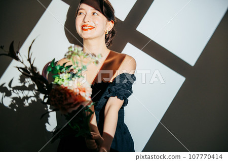 A woman in a dress A woman in a dress 107770414
