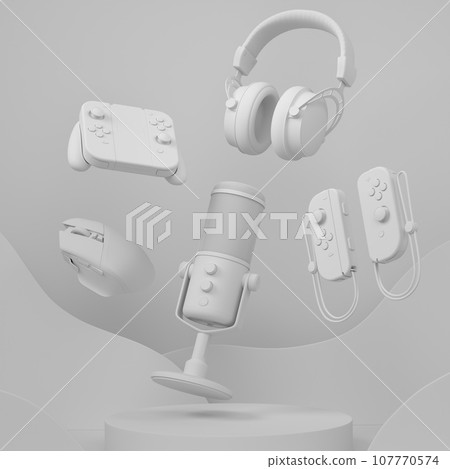 Set of video game joystick, microphone and headphones on monochrome podium 107770574