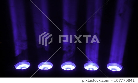 Lighting equipment with smoke. Close up Spot Light for film , Tv show , cinema , concert in studio and outdoor. Stage lighting effect in the dark 107770841
