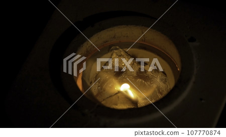 Iron lingot on 1000 C temperature in furnace. Inside a furnace 107770874