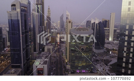 Aerial view from Dubai. Modern buildings. Futuristic aerial view of residential skyscrapers in the Dubai Marina walk. Dubai aerial skyline on a beautiful day 107770892