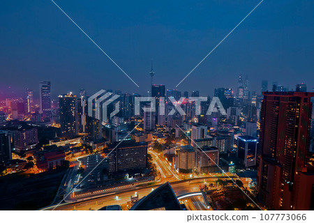 Kuala Lumpur skyline at night, a dazzling display of city lights 107773066