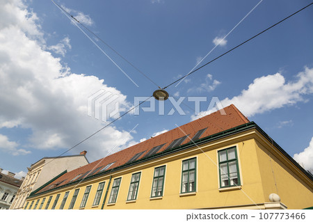 Night lighting lantern on tripwires over one of the streets of Vienna 107773466