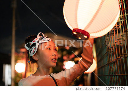 Girl enjoying the festival Girl enjoying the festival 107773574