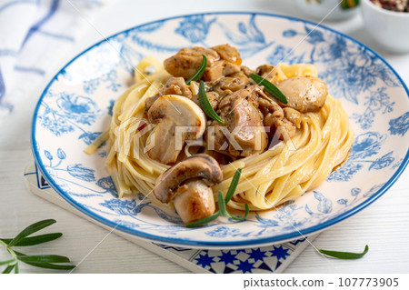 Italian pasta with mushrooms. Italian pasta with mushrooms. 107773905
