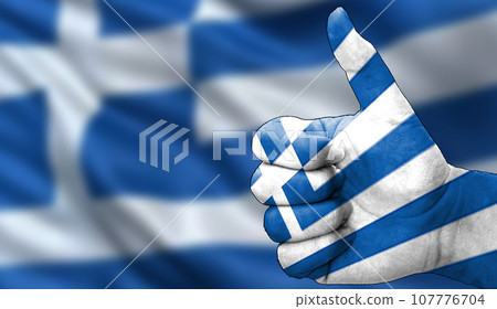 thumbs up in approval with the Greek flag painted thumbs up in approval with the Greek flag painted 107776704