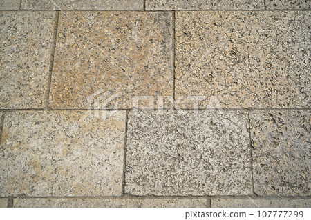 Gray and beige colored square paving stone, Seamless tiled stone Gray and beige colored square paving stone, Seamless tiled stone 107777299