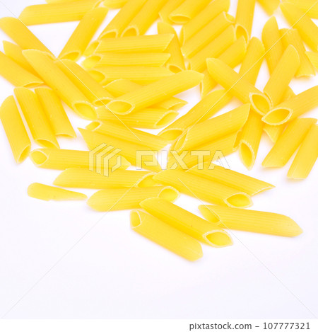 Raw fresh and healthy macaroni pasta foot background 107777321