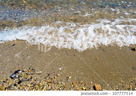 Calm sea or ocean wave on the beach by the sea, location Turkey Istanbul Buyukada 107777514