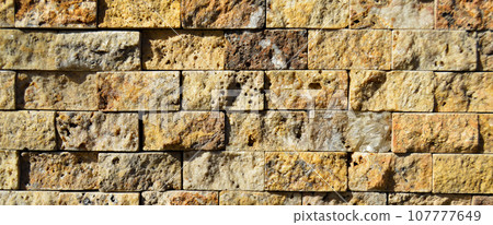 Cutting beige marble wall rectangular, seamless lined up Cutting beige marble wall rectangular, seamless lined up 107777649