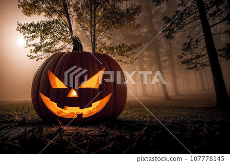 pumpkin head glows in the dark forest at night, scary and mystical, Halloween concept, the moon shines through the fog, black silhouettes 107778145