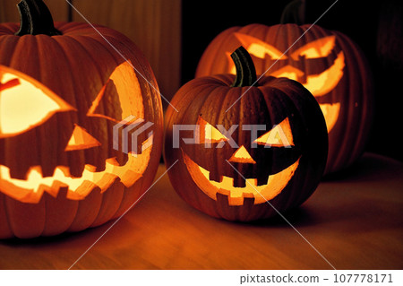 halloween holiday decoration with pumpkins, autumn leaves and candles, still life, cozy, festive background halloween holiday decoration with pumpkins, autumn leaves and candles, still life, cozy, festive background 107778171